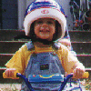 John on his tricycle